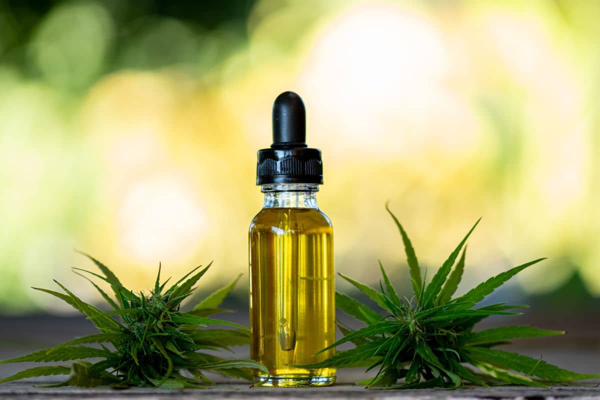 Delta 8 bottle with marijuana strains