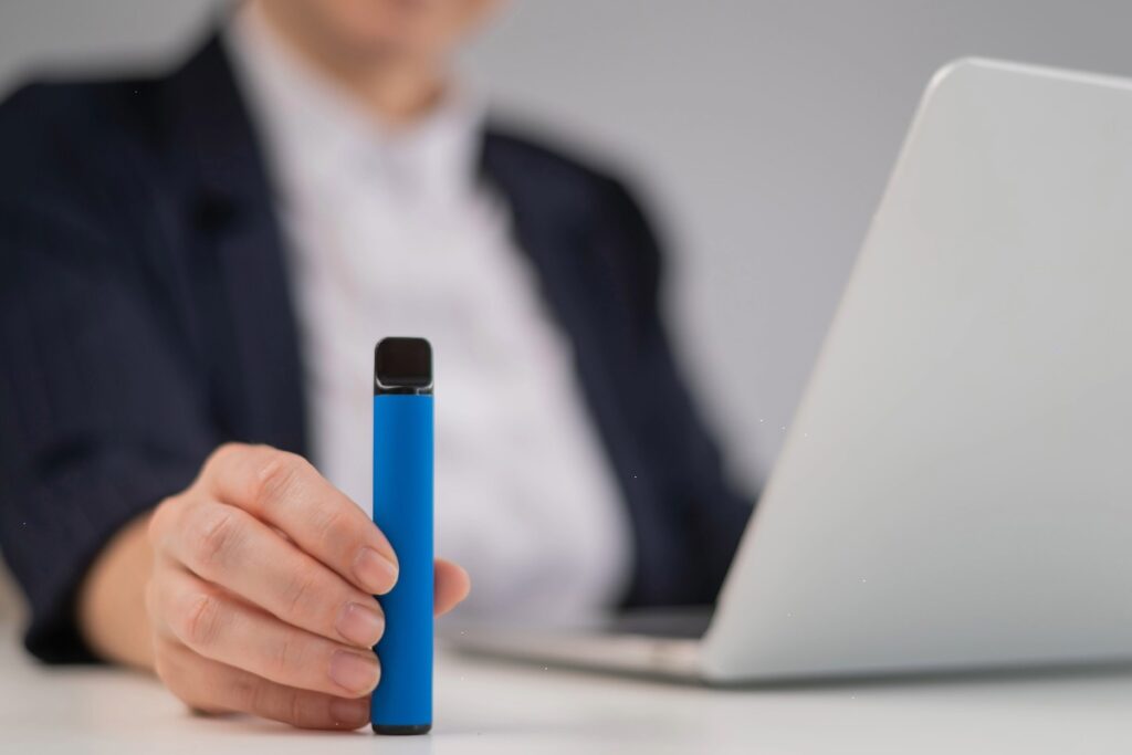 A person finding vape fix on computer