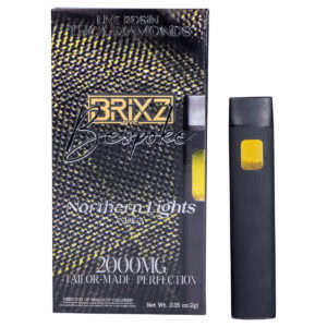 A rectangular BRIXZ NYC Bespoke THCA Disposable 2g package displays a sleek black vape pen with a yellow window, featuring Live Rosin THCA Diamonds, Northern Lights Indica, and highlighting its impressive 2000mg potency.